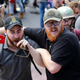 Baked Alaska on the left (identified by the AP as a “white nationalist demonstrator”) and his bodyguard (right) at the entrance to Lee Park in Charlottesville, Virginia on August 12, 2017 (AP Photo/Steve Helber)
